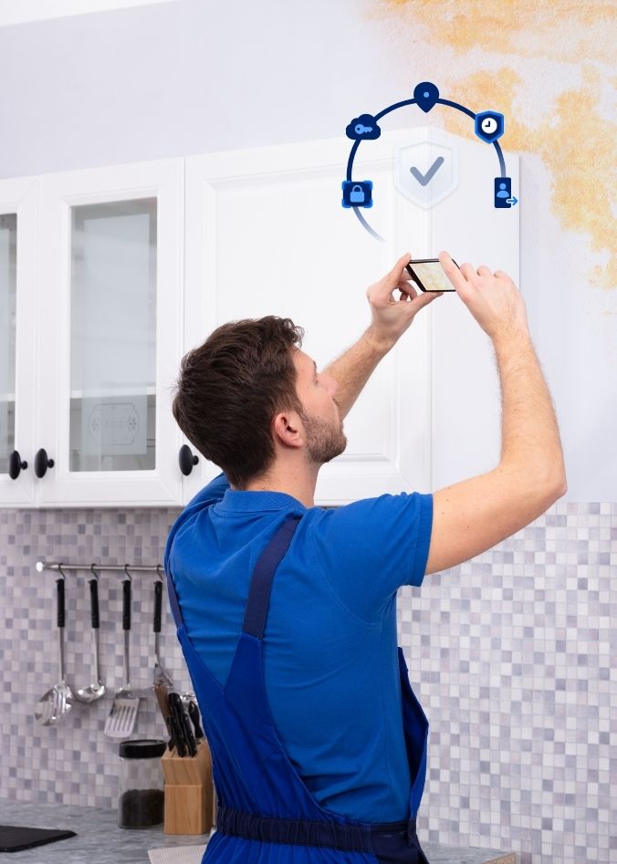 Man taking photos to get a certified property inspection